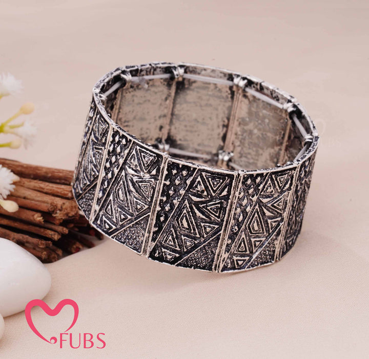 Traditional Etched Bracelet with Sculptural Geometric Detailin