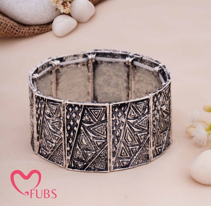 Traditional Etched Bracelet with Sculptural Geometric Detailin