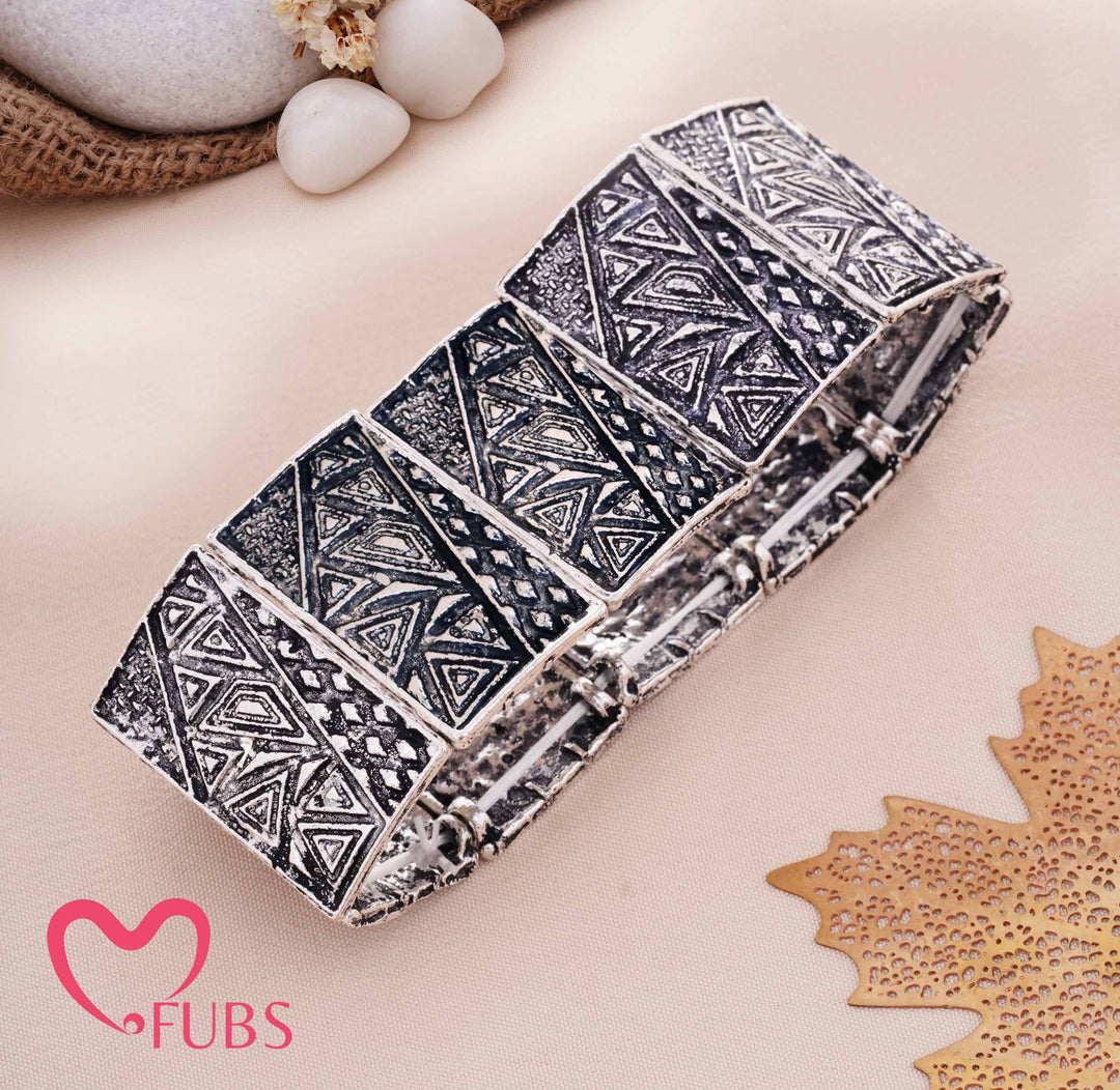 Traditional Etched Bracelet with Sculptural Geometric Detailin