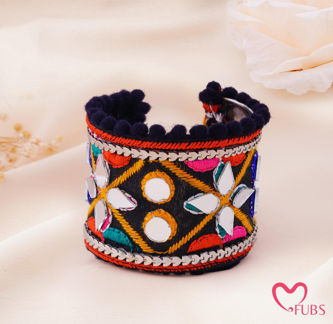 Geometric Mirror Embroidered Pom Trim Cuff