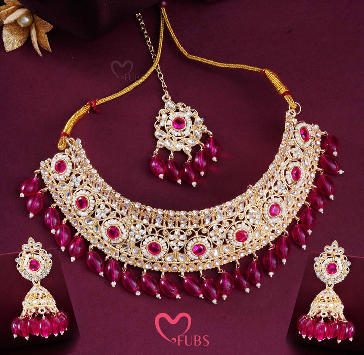 Gold Finish Kundan Choker, Jhumka & Maang Tikka Set