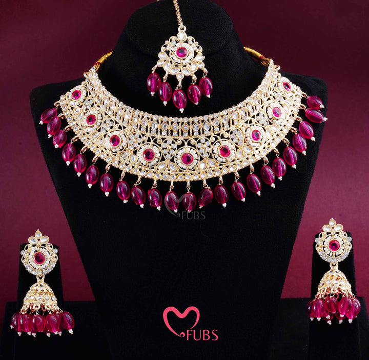 Gold Finish Kundan Choker, Jhumka & Maang Tikka Set