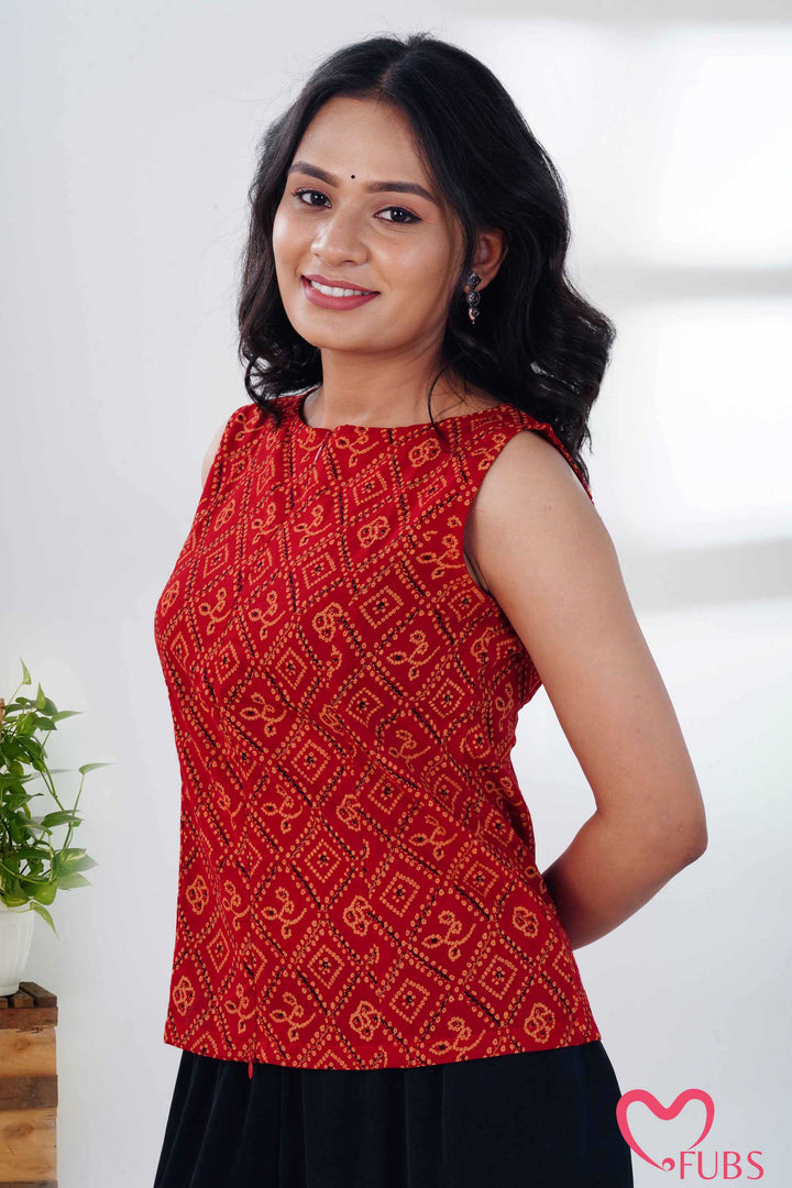 Orange Red Printed Peplum Kurti & Silver Drop Earrings