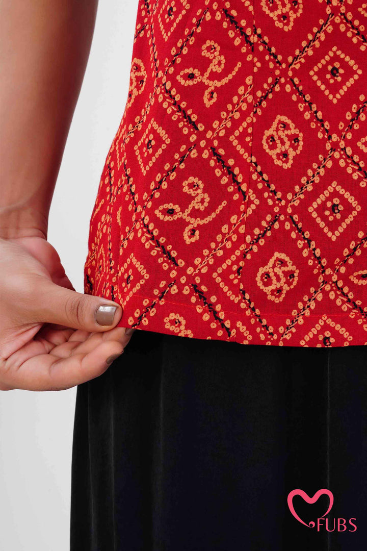 Orange Red Printed Peplum Kurti & Silver Drop Earrings