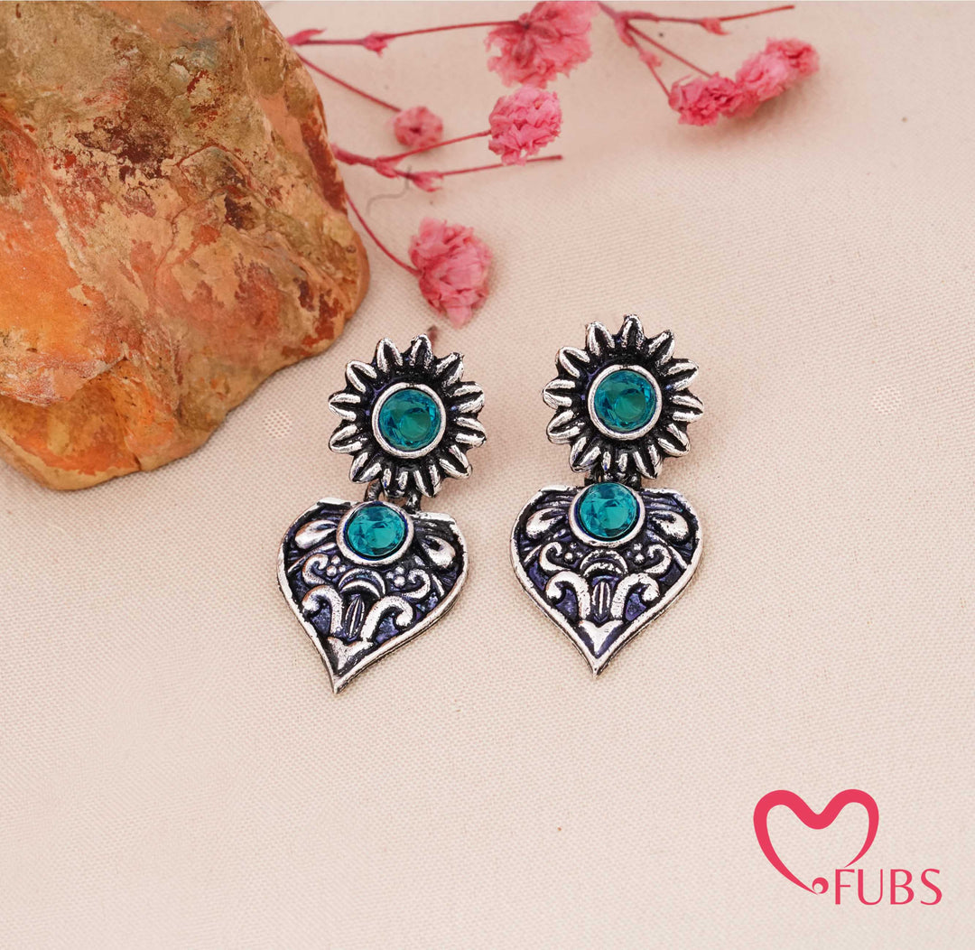 Traditional Flower Stud with Luminous Stone