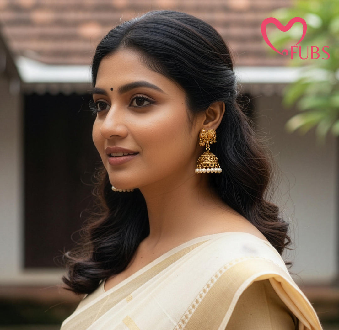 Gold Elephant Motif Jhumka Earrings with Pearls