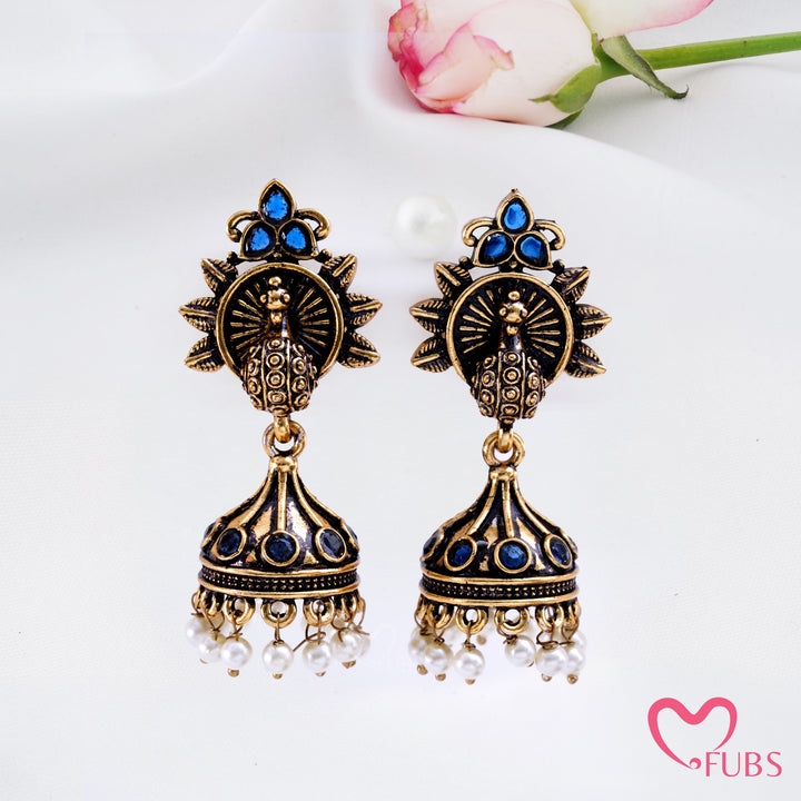 Sunburst Peacock Jhumka Earrings with Pearl Fringe Detail