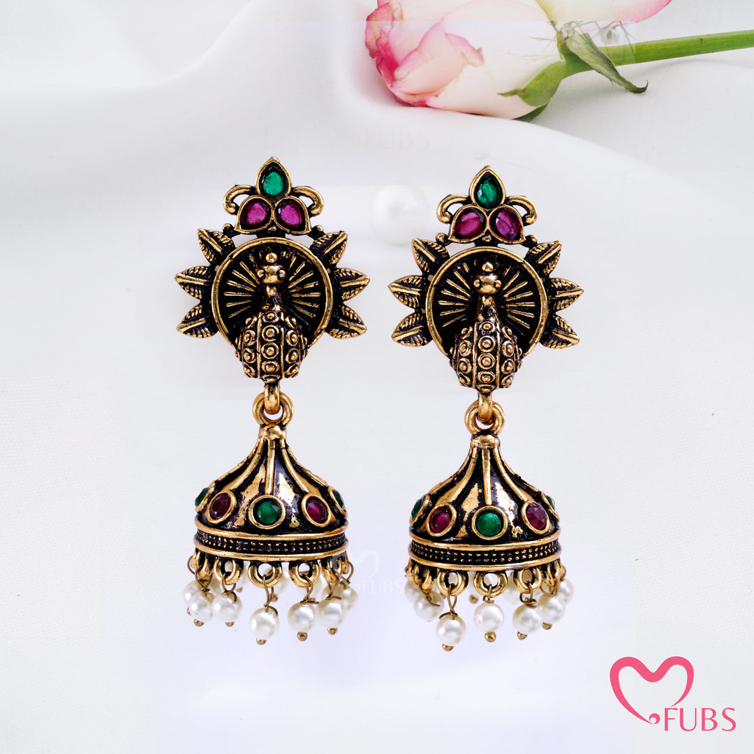 Sunburst Peacock Jhumka Earrings with Pearl Fringe Detail