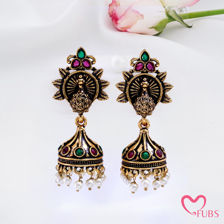 Sunburst Peacock Jhumka Earrings with Pearl Fringe Detail