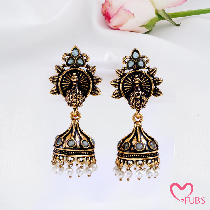 Sunburst Peacock Jhumka Earrings with Pearl Fringe Detail