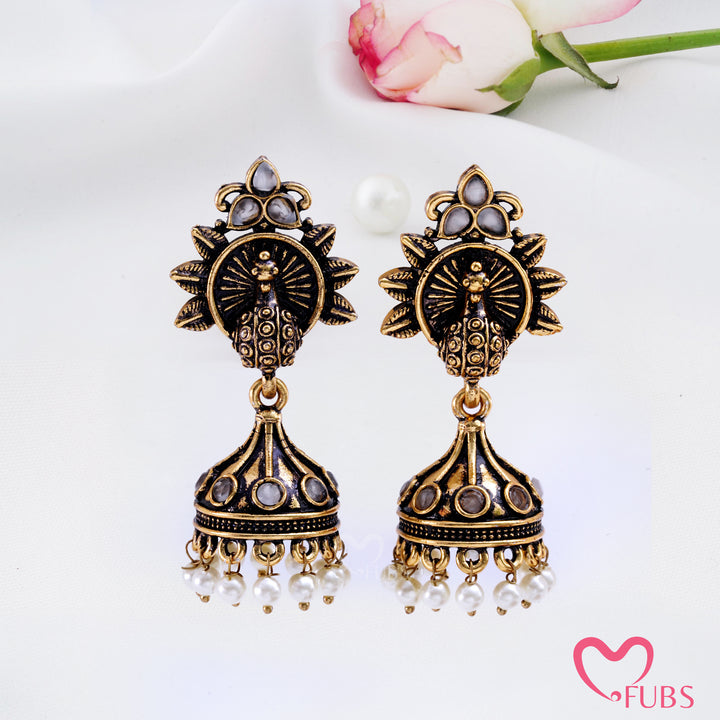 Sunburst Peacock Jhumka Earrings with Pearl Fringe Detail