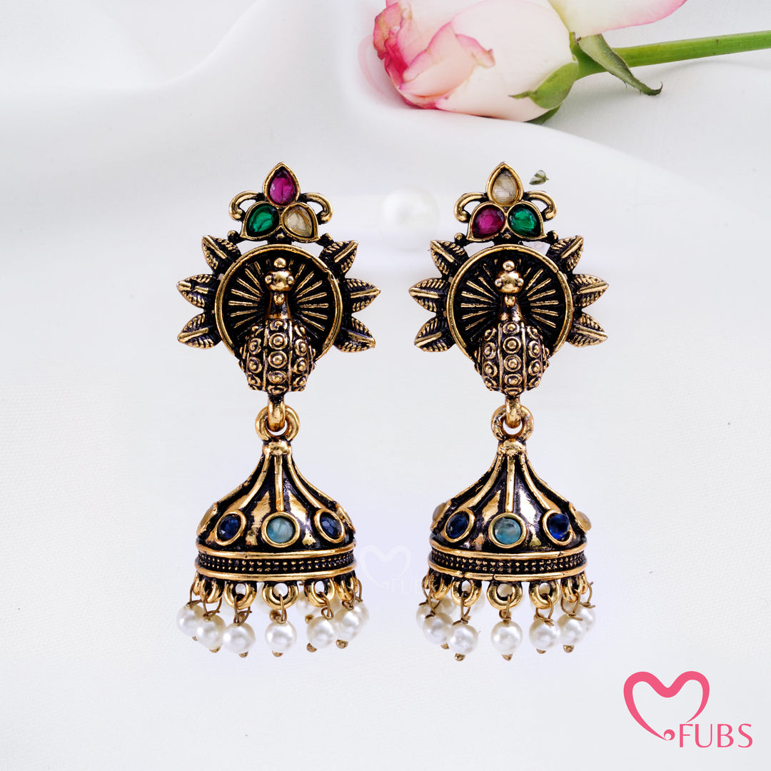 Sunburst Peacock Jhumka Earrings with Pearl Fringe Detail