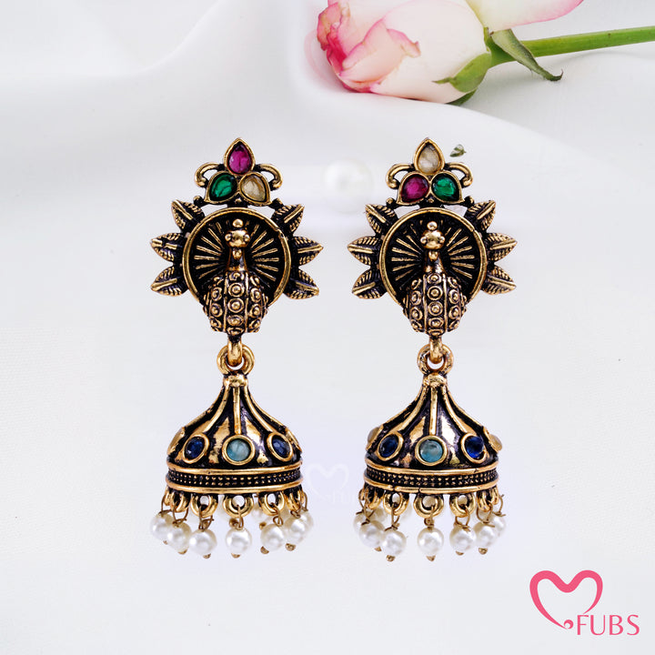 Sunburst Peacock Jhumka Earrings with Pearl Fringe Detail