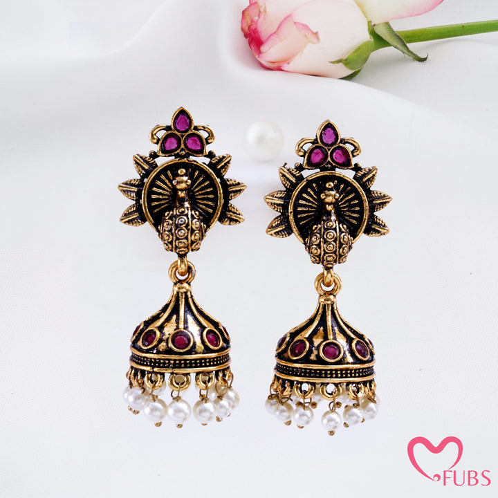 Sunburst Peacock Jhumka Earrings with Pearl Fringe Detail
