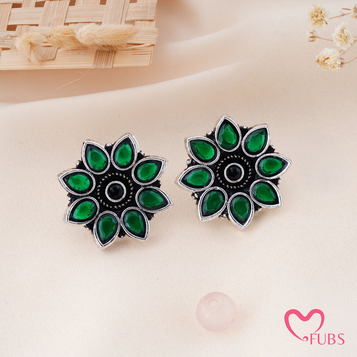 Radiant Sunburst Stud Earrings with Teardrop Accents