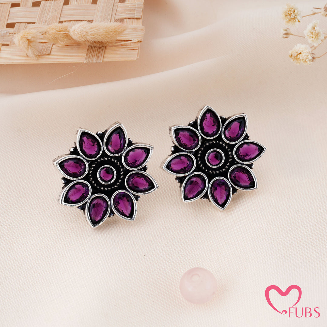 Radiant Sunburst Stud Earrings with Teardrop Accents
