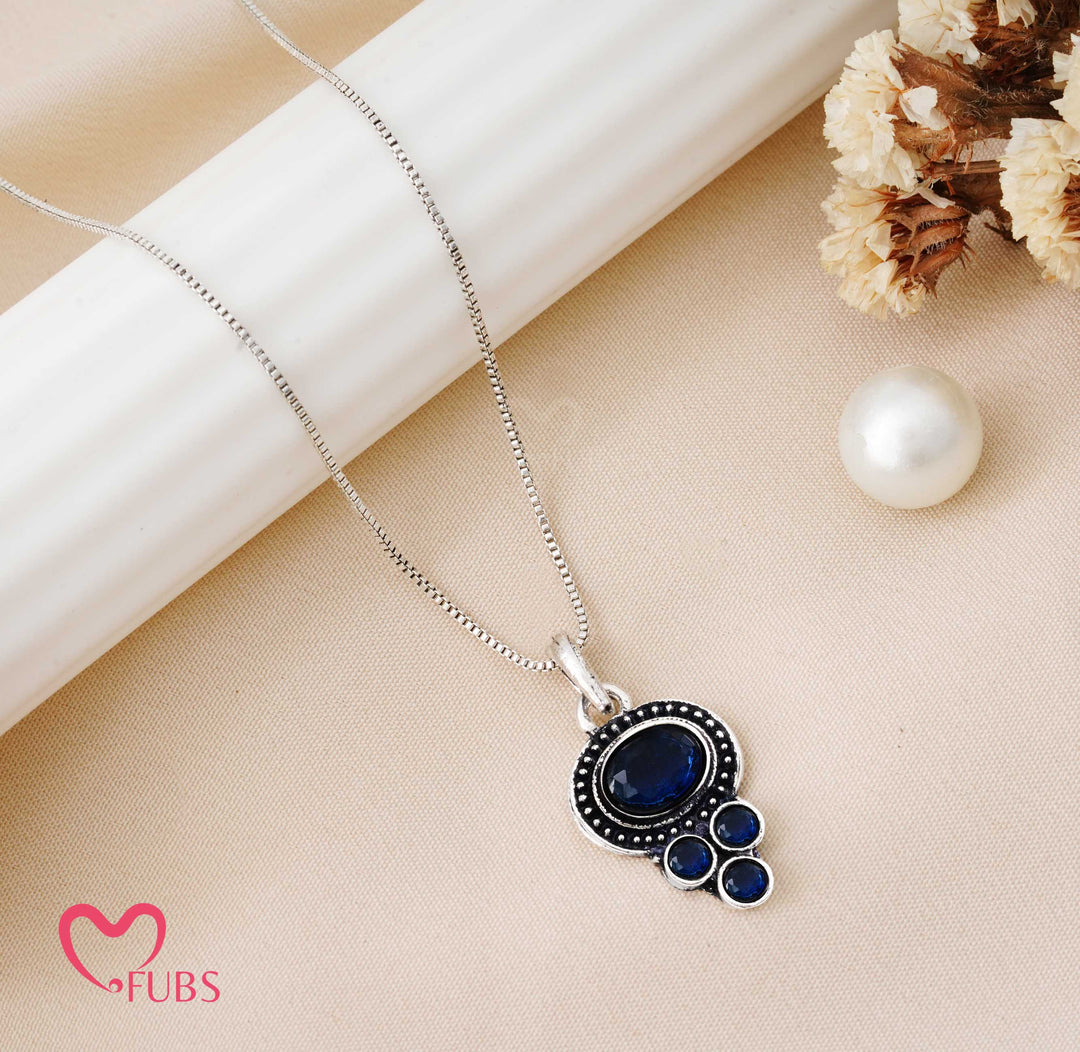 Necklace with Oval and Round Gemstone Pendant