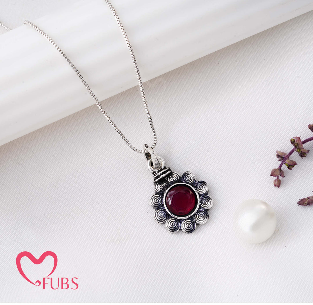 Necklace with Spiral Gemstone Pendant Design