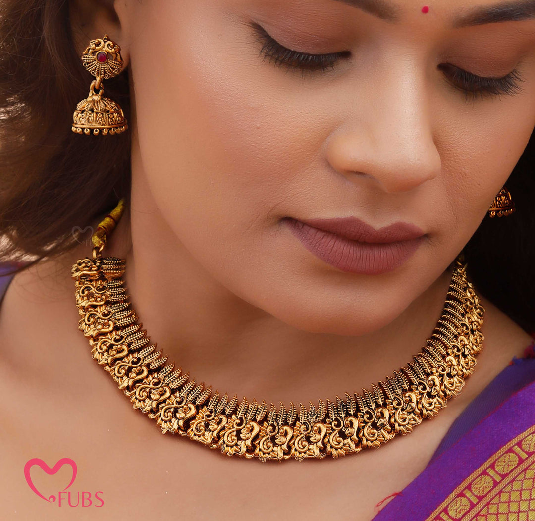 Antique Gold-Toned Temple Necklace Set with Jhumka Earrings
