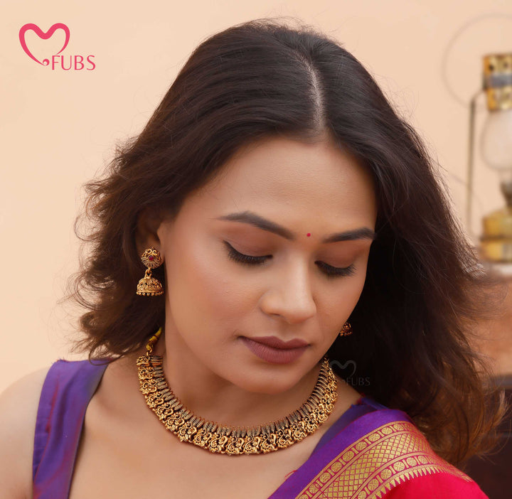 Antique Gold-Toned Temple Necklace Set with Jhumka Earrings
