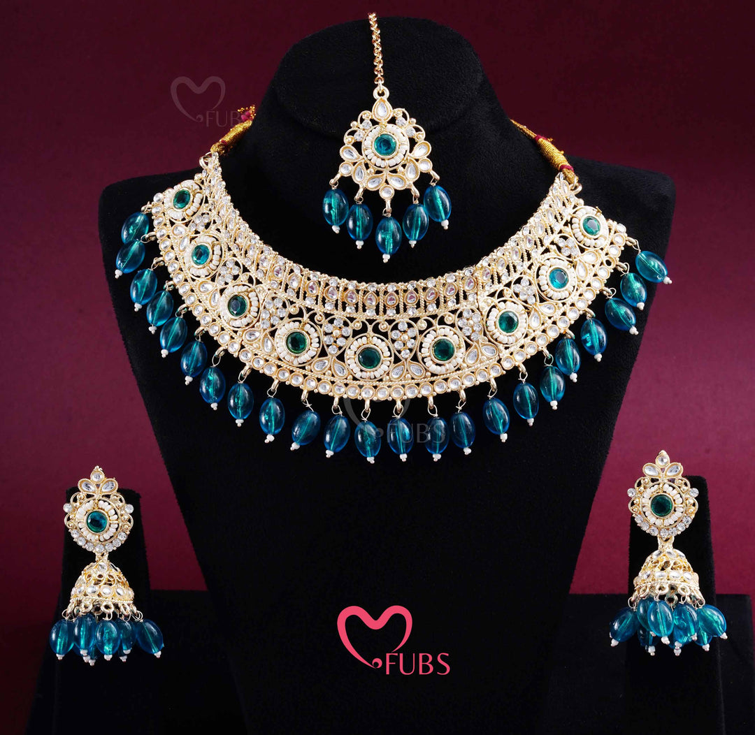 Gold Finish Kundan Choker, Jhumka & Maang Tikka Set