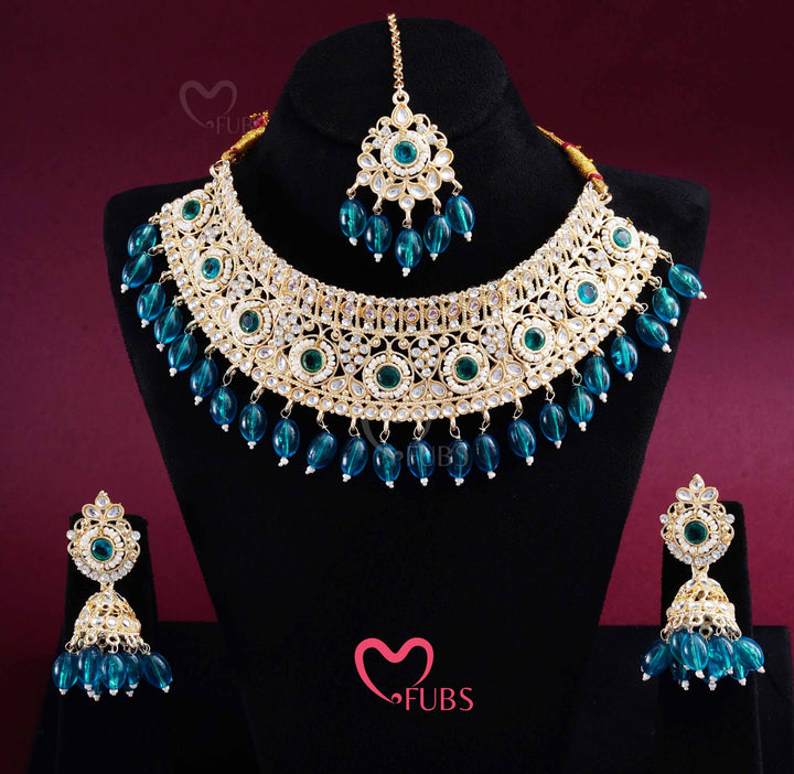 Gold Finish Kundan Choker, Jhumka & Maang Tikka Set