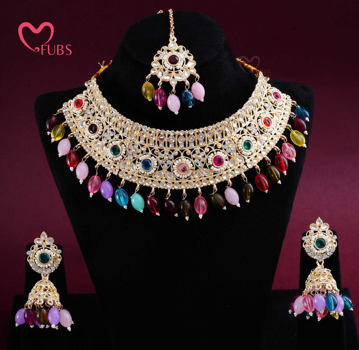 Gold Finish Kundan Choker, Jhumka & Maang Tikka Set