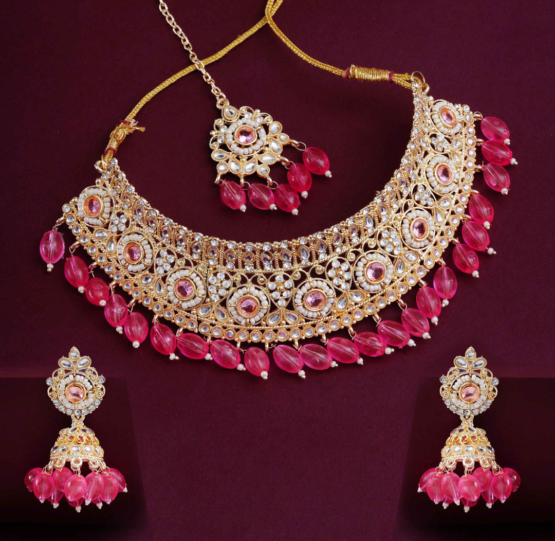 Gold Finish Kundan Choker, Jhumka & Maang Tikka Set