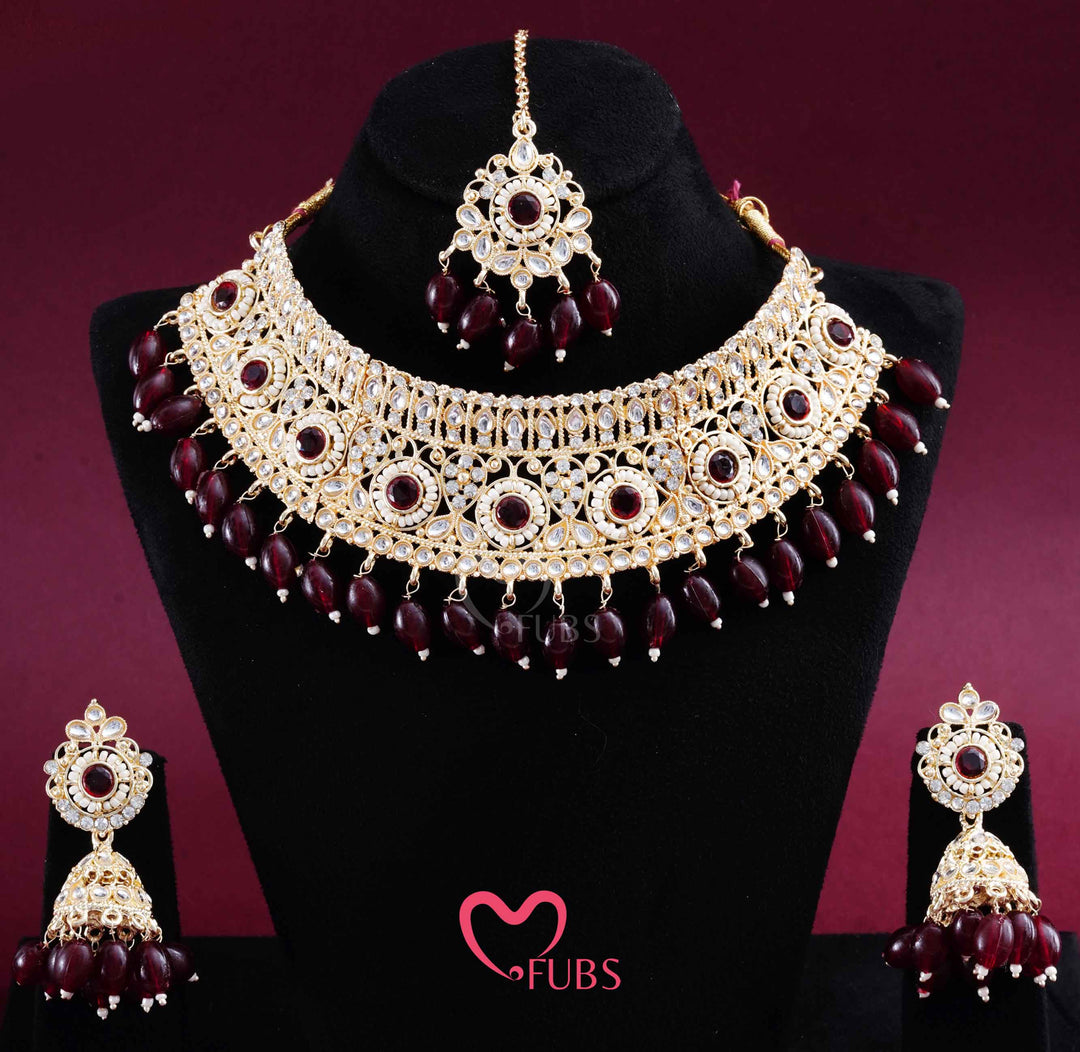 Gold Finish Kundan Choker, Jhumka & Maang Tikka Set