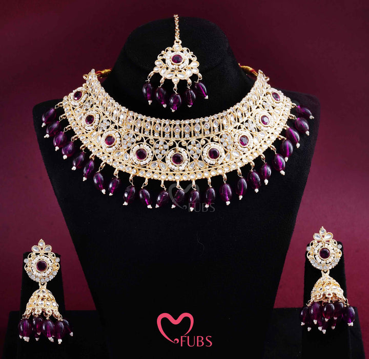Gold Finish Kundan Choker, Jhumka & Maang Tikka Set