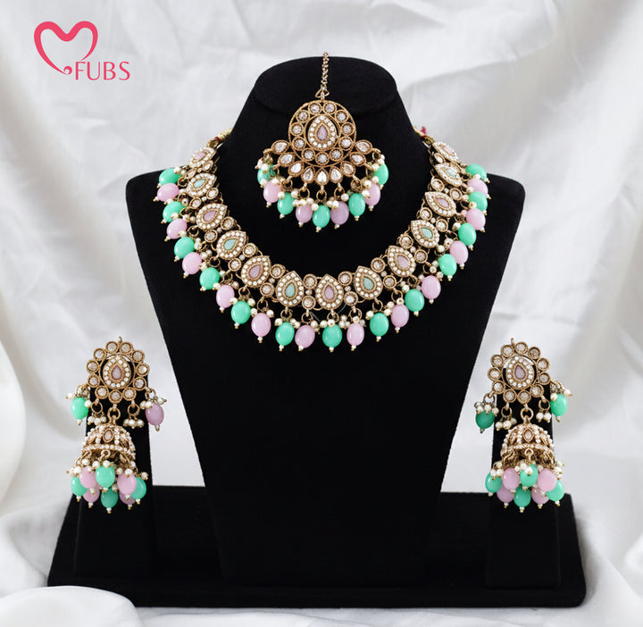 Artisanal Floral Motif Gold-Finish Necklace Set with Jhumka Earrings & Maang Tikka