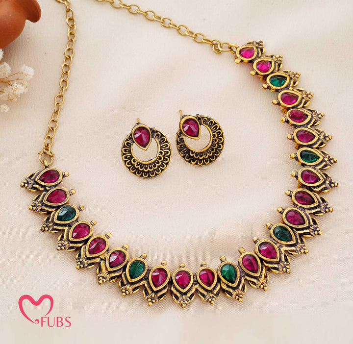 Traditional Matte Gold Paisley Choker Set with Dark Stones