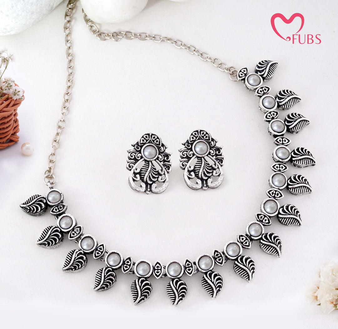 Traditional Oxidized Silver-Tone Necklace Set with Intricate Leaf Motifs