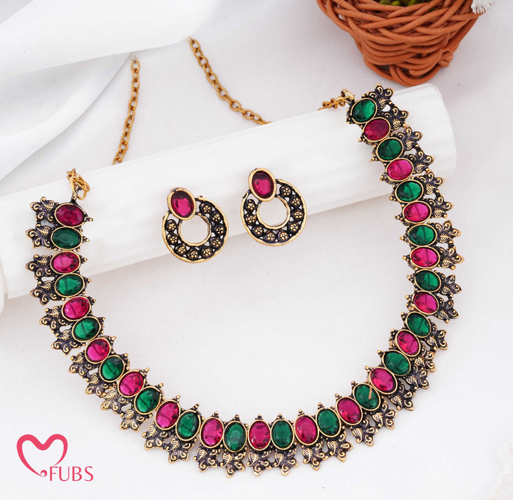 Dual-Tone Antique Matt Gold Choker Set with Tribal Aesthetic & Kemp Stones