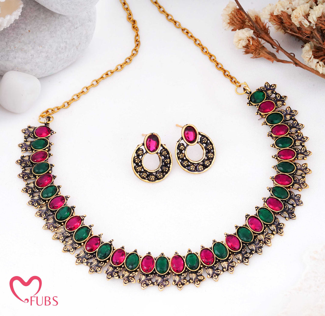 Dual-Tone Antique Matt Gold Choker Set with Tribal Aesthetic & Kemp Stones