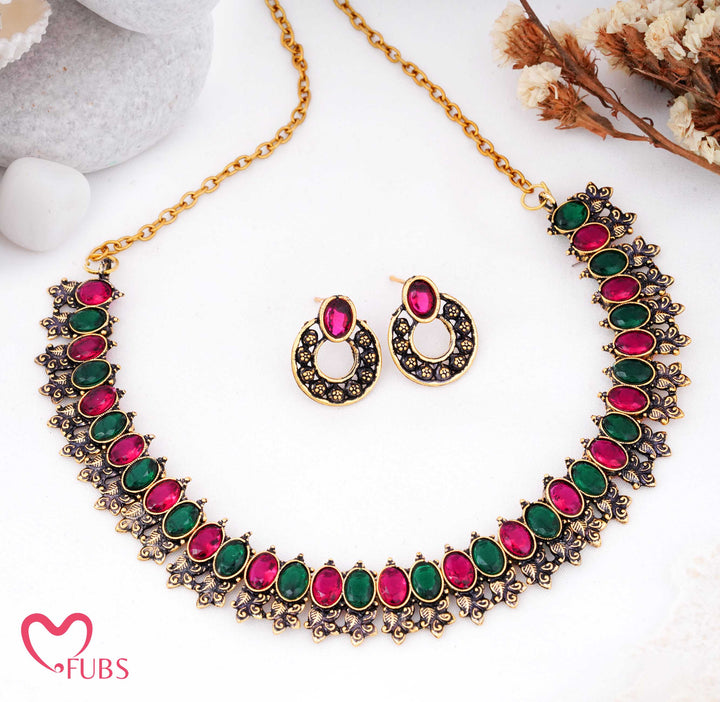 Dual-Tone Antique Matt Gold Choker Set with Tribal Aesthetic & Kemp Stones